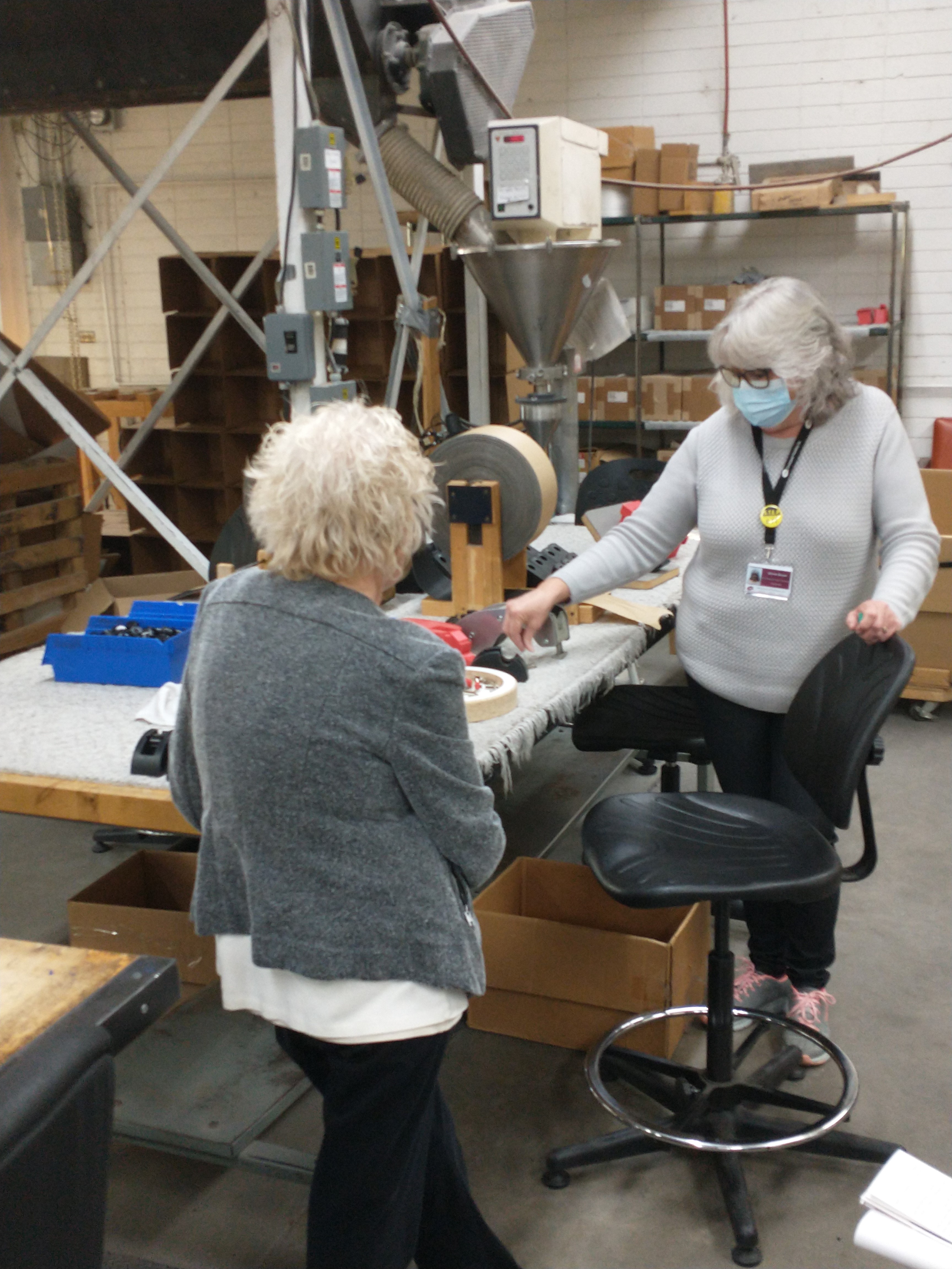 Shirrie presenting tape dispenser line to a guest