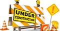 Construction icons including orange cones and signs