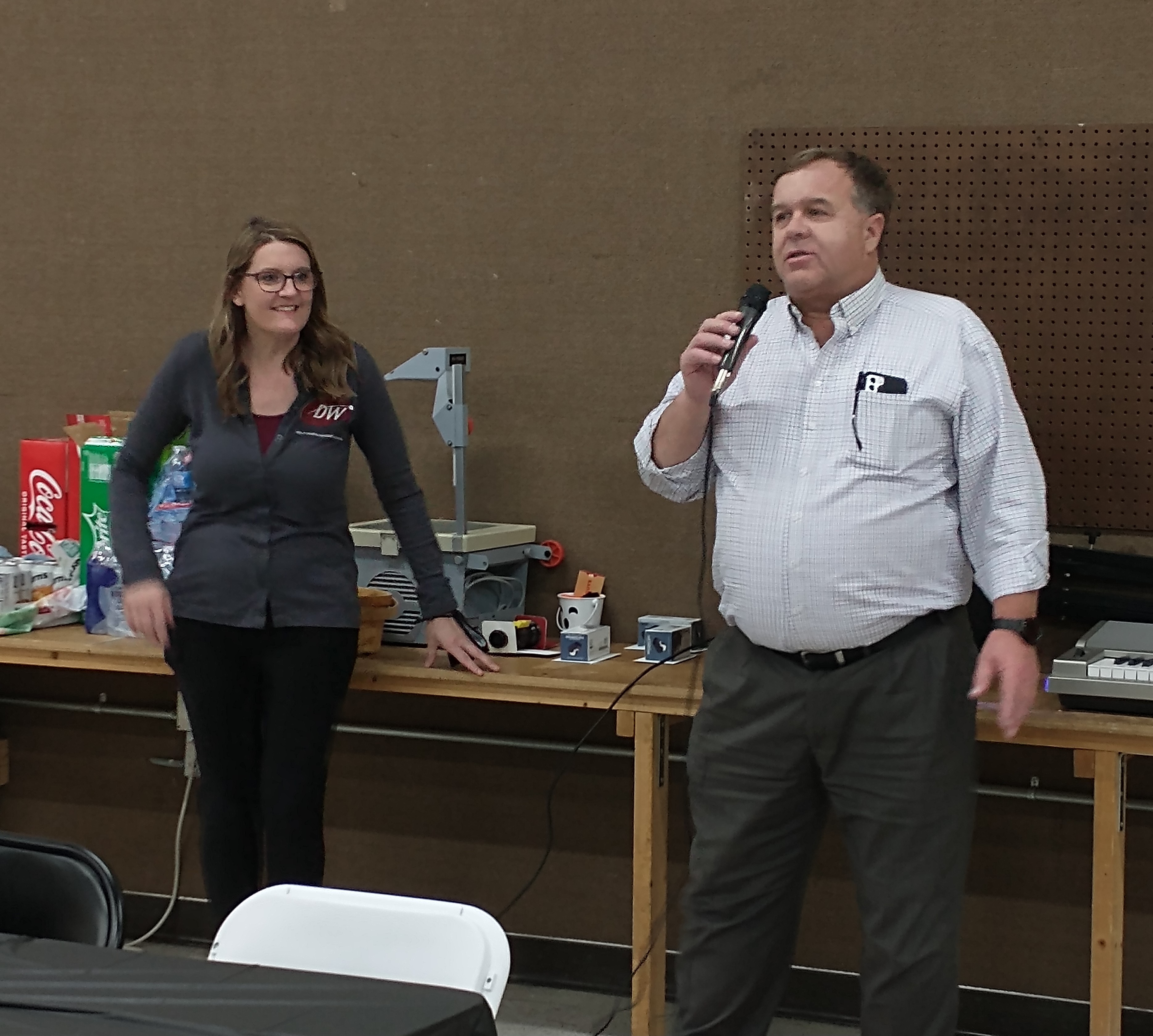 DWI CEO McKayla and Chamber CEO Chip addressing the guests