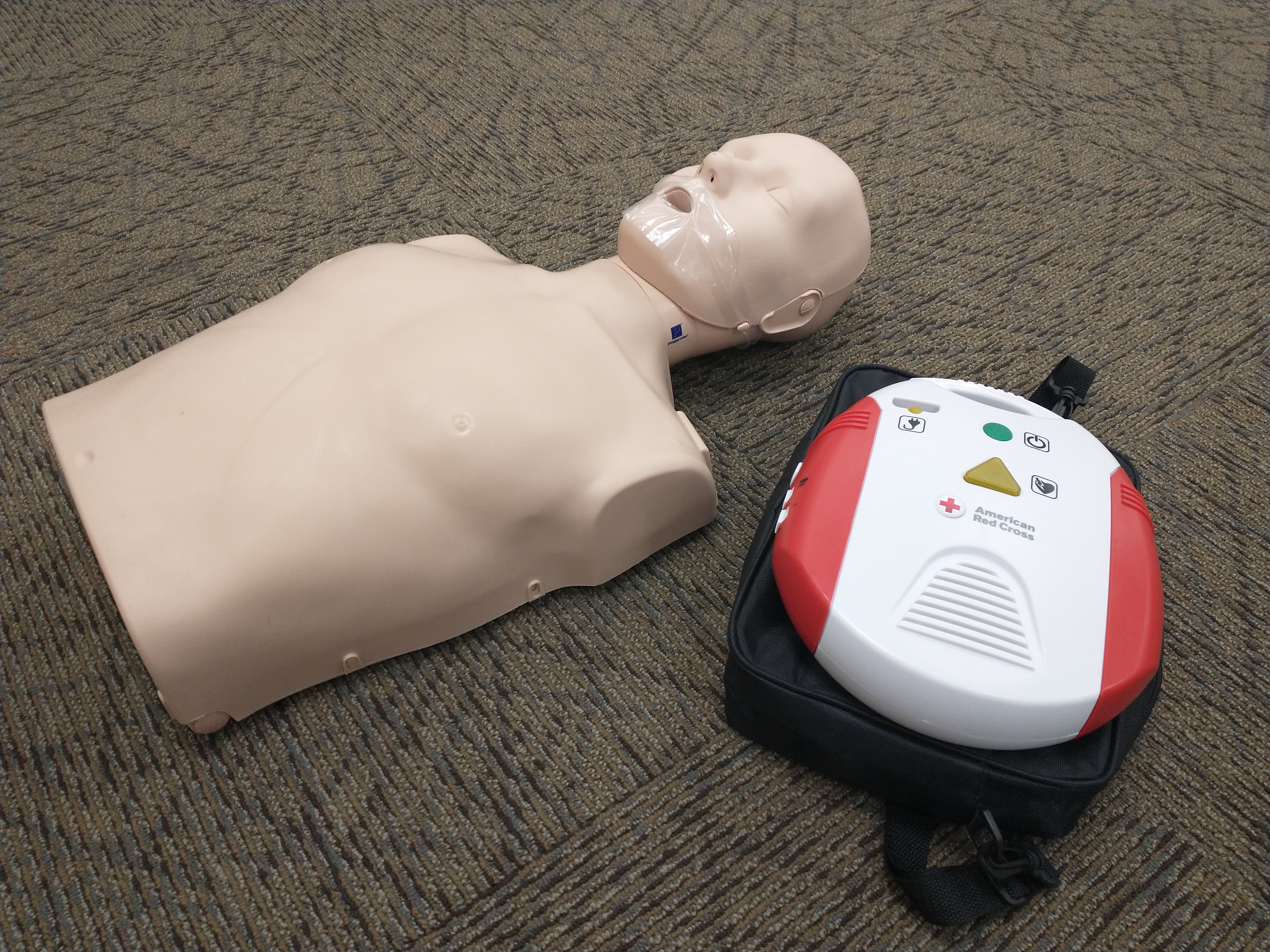Adult CPR Manikin and AED