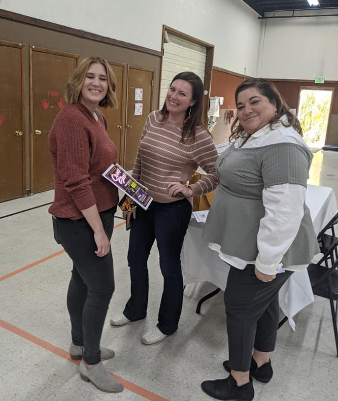3 guests standing at BAH
