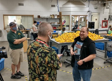 Channel 8 Interviewing Greg on production floor